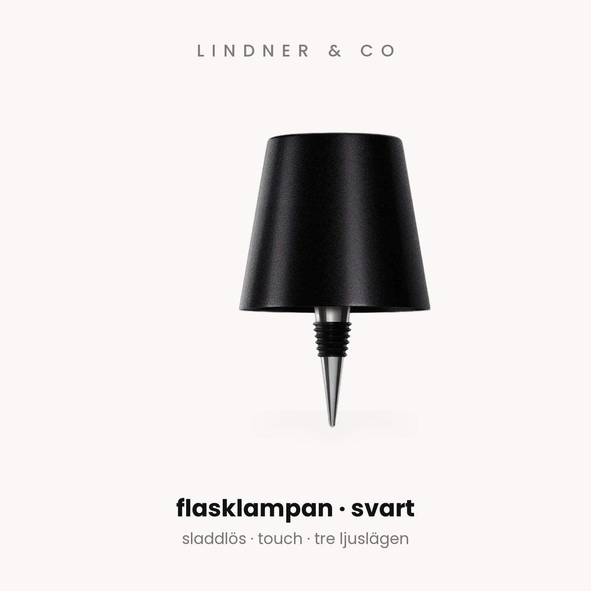 Flasklampan svart